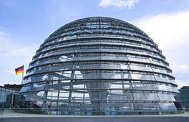 Germany, Berlin, Mitte, Tiergarten, exterior of the glass dome on the top of the Reichstag building designed by architect Norman Foster with a double-helix spiral ramp around the mirrored cone that reflect light into the debating chamber of the Bundestag below.