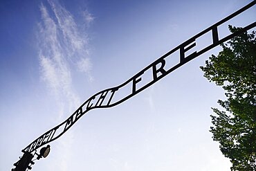 Poland, Auschwitz-Birkenau State Museum, Auschwicz Concentration Camp, 'Arbeit Macht Frei' slogan above the entrance gate.