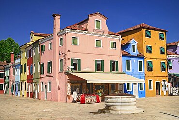 Italy, Veneto, Burano Island, Colourful row of house facades.