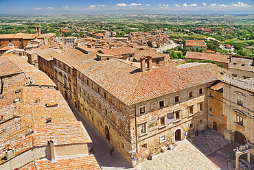 Italy, Tuscany, Montepulciano, View over the rooftops of the town towards distant hills from the tower of Palazzo Comunale or Town Hall.