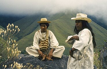 COLOMBIA People Kogi Ramonil and Juancho two Kogi priests from the Sierra de Santa Marta against a backdrop of misty green hills Named Ramonil and Juancho