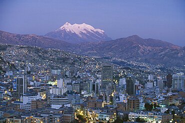 BOLIVIA  La Paz Cityscape and Mount Illimani at dusk.