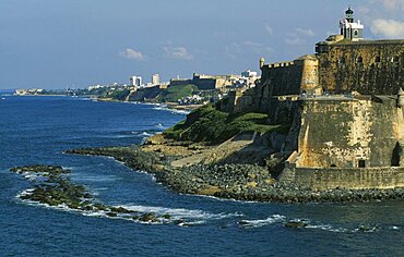 WEST INDIES Puerto Rico San Juan View along San Juan coastline with fort and old city walls.