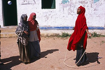 SOMALIA  Baidoa Girls playing skipping games with rope at Dr Ayub Primary School. African Eastern Africa Kids Learning Lessons Somalian Soomaliya Teaching