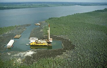 NIGERIA  Industry Aerial view over oil rig in swamp near Bonny. African Nigerian Western Africa