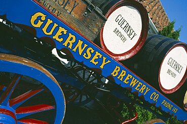 UNITED KINGDOM Channel Islands Guernsey Forest Parish. German Occupation Museum. Detail of Brewery barrels on cart displayed outside main entrance.