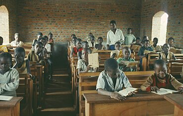 CONGO  Education Azande children sitting at wooden desks in school classroom. Zande Zaire