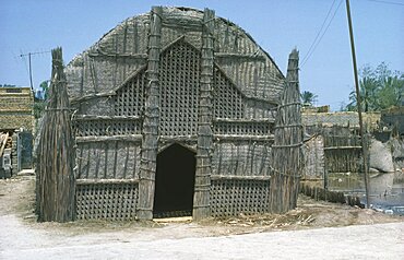 IRAQ South Shobaish Marsh Arab woven reed house  A Ma dan Mudhif.