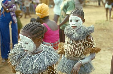 SIERRA LEONE  People Young girls attending initiation ceremony with white painted faces.