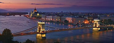 HUNGARY  Budapest View of Parliament and Szechenyi Lanchid  Chain Bridge from the Royal Palace at dusk. Tourism Travel Holidays Panorama River Danube Eastern Europe