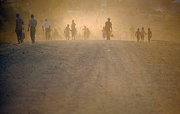 SOUTH AFRICA Mpumalanga Matsulu Protest march  people seen through dust and haze. township