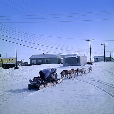 CANADA Nunavut Baffin Island Inuit dog sled in snow. North West Territory