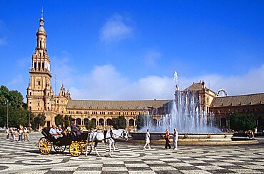 SPAIN Andalucia Seville Plaza de Espana Travel Tourism Holiday Vacation Explore Recreation Leisure Sightseeing Tourist Attraction Tour Destination Trip Journey Plaza de Espana Seville Sevilla Andalucia Andalucian Andalusia Andalusian Spain Spanish Europe European Union EU Maria Luisa Park Parc Parque Blue Sky City Culture Cultural Building Architecture Architectural Square Landmark Bell Tower Water Fountain Horse Horsedrawn Carriage Transport Transportation Visitors Sightseers Holidaymakers Tourists People Vacation Equestrian Espainia Espanha Espanya European Union Hispanic Southern Europe