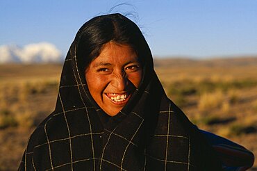 Quecha shepherdess smiling near La Paz, La Paz, Altiplano, Bolivia