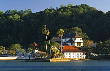 Temple of the Tooth aka Dalada Maligawa, View over river toward the Buddhist Temple, Kandy, Sri Lanka