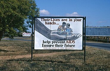 Billboard with AIDS prevention poster produced by the National Aids Prevention and Control Programme, Lusaka, Zambia