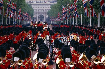 SOCIETY Military Army The Queen and Prince Phillip returning down The Mall with Guardsmen after Trooping The Colour Ceremony