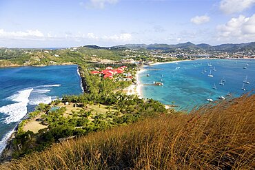 The isthmus leading to Pigeon Island seen from Signal Hill within the National Historic Park with the Atlantic Ocean on the left and the Caribbean of Rodney Bay on the right, Gros Islet, St Lucia