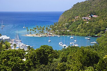 Marigot Bay The harbour with yachts at anchor the and lush surrounding valley, Castries, St Lucia