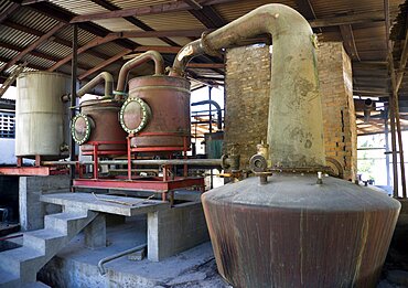 The wood fired copper stills at the River Antoine rum distillery, Caribbean