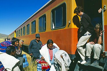 PERU  Puno Department Train stopped at the altiplano on the highest pass on the line between Puno to Cusco  passengers disembarking.