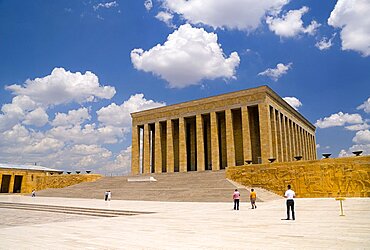 Turkey, Ankara, Anitkabir, Mausoleum of Mustafa Kemal Ataturk the founder of the Turkish Republic and president in 1923 who died in 1938. Monumental rectangular structure set on hilltop with flight of steps to colonnaded entrance. Visitors in middle foreground.