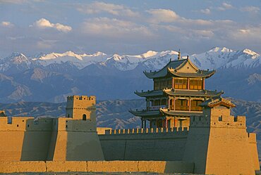 CHINA Gansu Jiayuguan The fortress at the western end of the Great Wall with snow capped mountains behind  Silk Road Route