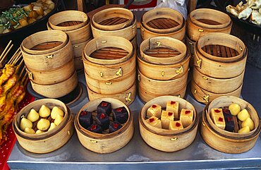 Donghua Yeshi food market Display of bamboo steamers of sweetmeats, Beijing, China