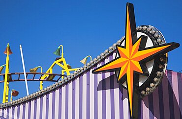 England, Lincolnshire, Skegness, Facade of amusement arcade in clear blue sky.