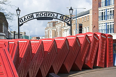 Red telephone box sculpture entitled Out of Order by David Mach, Kingston upon Thames, Surrey, England, United Kingdom, Europe