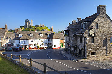 Corfe Castle and village on a summer morning, Corfe, Dorset, England, United Kingdom, Europe