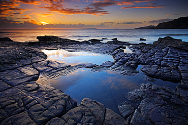 Rockpools on Broad Bench looking towards Gad Cliff and the Isle of Portland, Hobarrow Bay, Jurassic Coast, UNESCO World Heritage Site, Dorset, England, United Kingdom, Europe