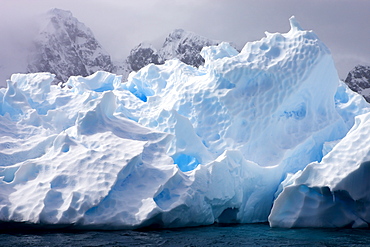 Intricate ice patterns on a weathered iceberg, Pleneau Island, Antarctic Peninsula, Antarctica, Polar Regions