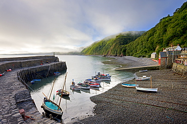 Fishing boats moored in the harbour at Clovelly, Devon, England, United Kingdom, Europe