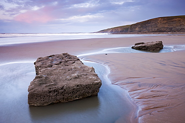 Rockpools on the sandy beach at Dunraven Bay, Southerndown, Glamorgan, Wales, United Kingdom, Europe