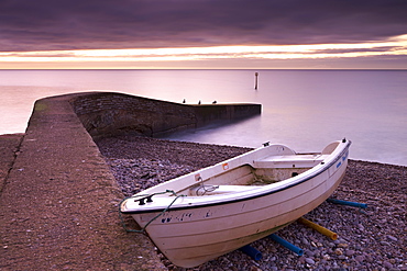 Fishing boat on Sidmouth beach at dawn, Sidmouth, Devon, England, United Kingdom, Europe