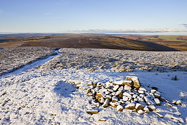 Stone Cairn at Dunkery Beacon on a snowy winters morning, Exmoor National Park, Somerset, England, United Kingdom, Europe