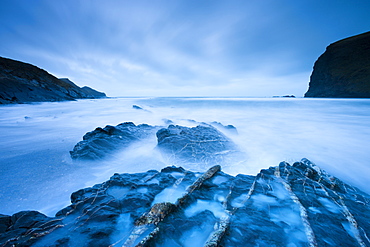 Long exposure at twilight on Crackington Haven beach on North Cornwall, England, United Kingdom, Europe