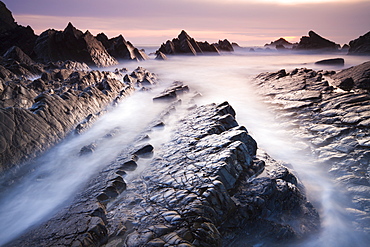 Dramatic coastal scenery at sunset, Hartland Quay, Devon, England, United Kingdom, Europe