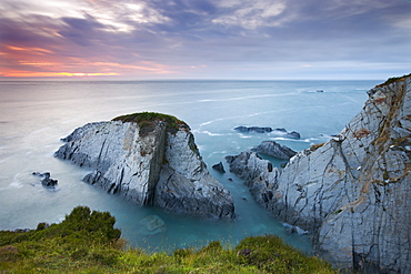 Slate cliffs near Morte Point at sunset, Mortehoe, North Devon, England, United Kingdom, Europe