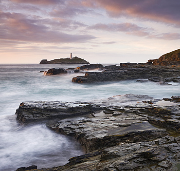 Godrevy Lighthouse off the rocky coast of Godrevy Point, Cornwall, England, United Kingdom, Europe