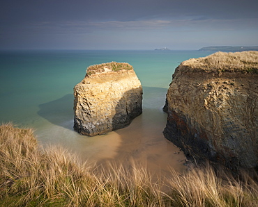 Rock stack on the sandy beach at Gwithian Towans, Cornwall, England, United Kingdom, Europe