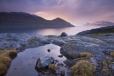 Sunset over Funningsfjordur and the island of Kalsoy, Eysturoy, Faroe Islands, Denmark, Europe