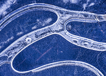 Ice pattern in frozen pond, Dartmoor, Devon, England, United Kingdom, Europe 