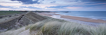 Twilight over Embleton Bay, viewed from the sand dunes, Northumberland, England, United Kingdom, Europe 