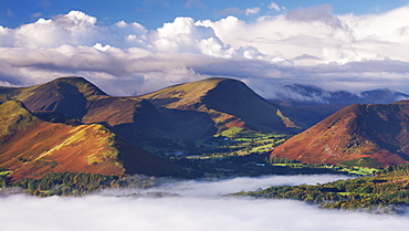 Morning mist floats around the Newlands Valley and Catbells mountain in autumn, Lake District, Cumbria, England, United Kingdom, Europe 