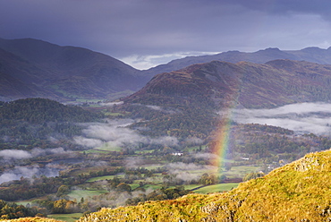 Rainbow over mist shrouded autumn landscape, Elterwater, Lake District, Cumbria, England, United Kingdom, Europe 