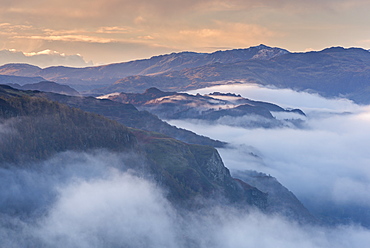 Mist shrouded mountains at dawn, Lake District, Cumbria, England, United Kingdom, Europe