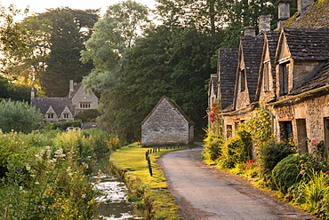 Picturesque cottages at Arlington Row in the Cotswolds village of Bibury, Gloucestershire, England, United Kingdom, Europe