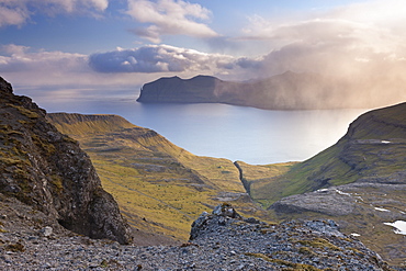 Looking towards the island of Vagar from the mountains of Streymoy in the Faroe Islands, Denmark, Europe